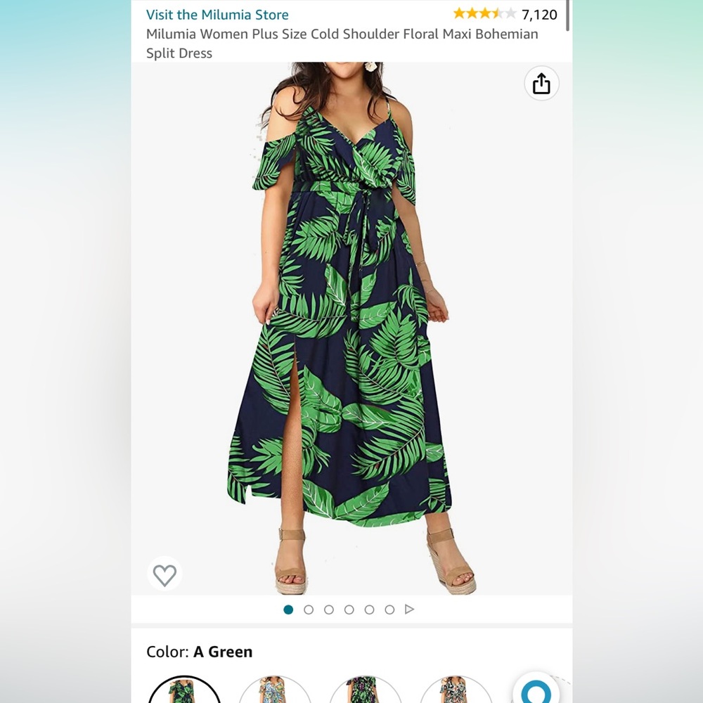 Never worn. Navy and green dress with leaf pattern.